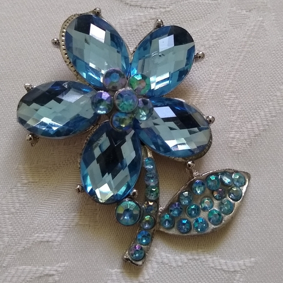 Five faux sapphire and rhinestone flower brooch